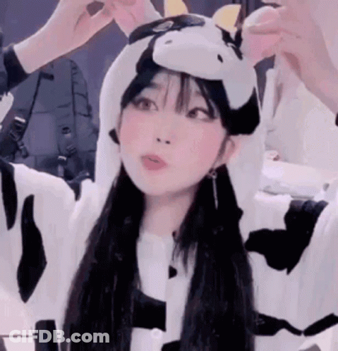 Girl In Cow Costume With Hood And Ears GIF