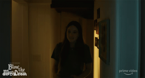 Girl In Dark Room Blow The Man Down GIF