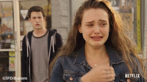 Girl In Denim Jacket Crying With Boy Behind GIF