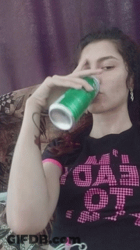 Girl In 'Eeep' Shirt Drinking From Green Can GIF