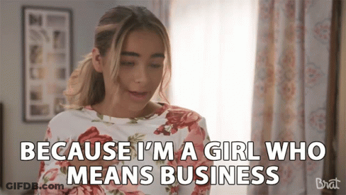 Girl In Floral Shirt Says Because I'm A Girl Who Means Business GIF