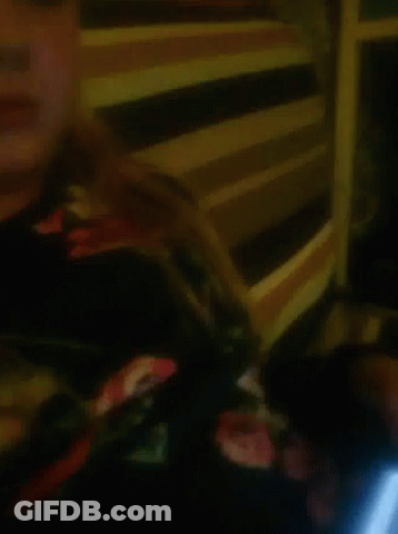 Girl In Floral Shirt GIF