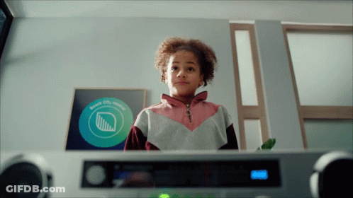 Girl In Front Of Beach City Sign GIF