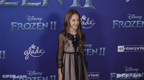 Girl In Front Of Frozen II Advertisement GIF