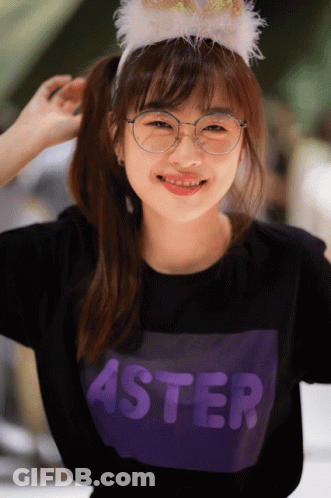 Girl In Glasses And Purple Shirt With Aster GIF