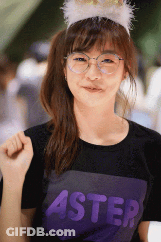 Girl In Glasses And Purple Shirt With Word Aster GIF