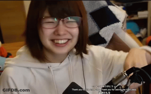 Girl In Glasses And White Hoodie Saying Thank You GIF