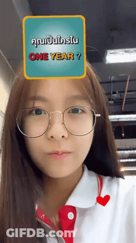Girl In Glasses And White Shirt With One Year Sign GIF