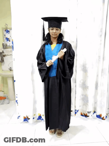 Girl In Graduation Cap And Gown GIF