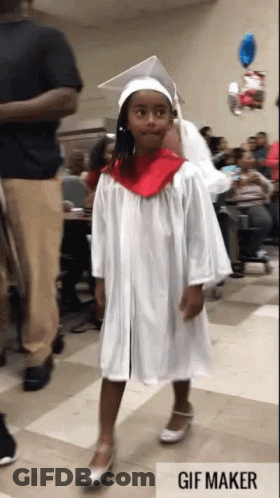 Girl In Graduation Cap And Gown GIF