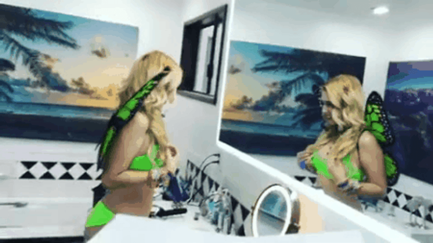 Girl In Green Butterfly Costume GIF