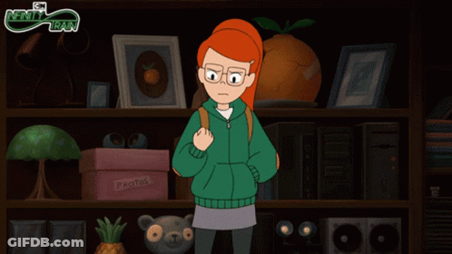 Girl In Green Jacket In Front Of Photo Shelf GIF