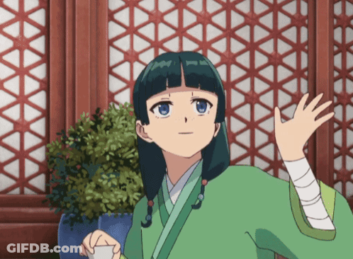 Girl In Green Kimono Holding White Cup GIF