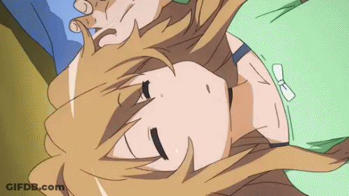 Girl In Green Shirt Sleeping With Bow GIF