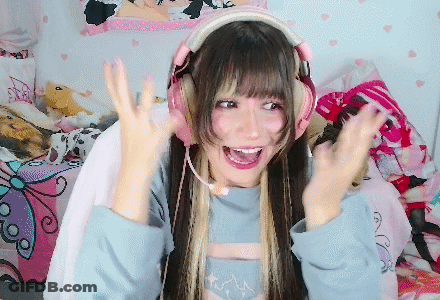 Girl In Headphones And Microphone Making A Face GIF