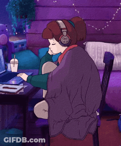 Girl In Headphones At Desk With Laptop GIF