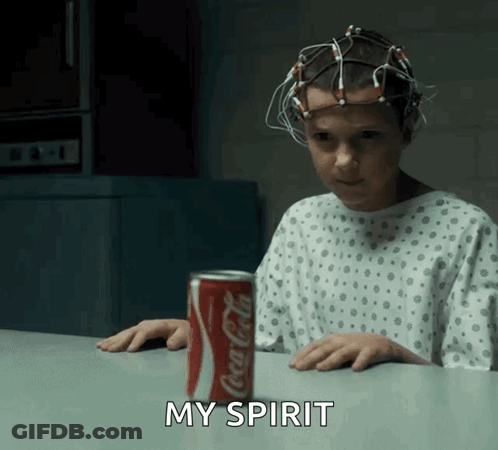 Girl In Hospital Gown Sitting With Coca Cola GIF