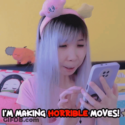 Girl In Kirby Headband Looking At Phone Saying I'm Making Horrible Moves GIF