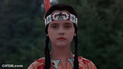 Girl In Native American Costume Scalping GIF