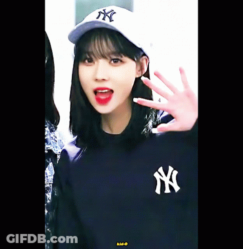 Girl In NY Baseball Cap And NY Sweatshirt GIF