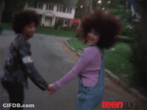 Girl In Overalls Holding Man's Hand Teen Ad GIF