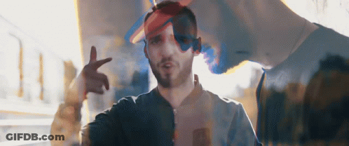 Girl In Overalls With Letter E On Shirt GIF