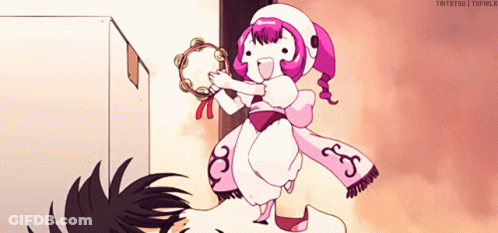 Girl In Pink And White Holding Tambourine GIF