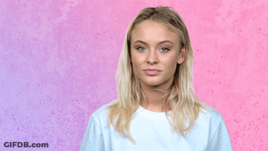 Girl In Pink Background Blank Stare GIF