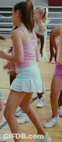 Girl In Pink Blue Dancing On Basketball Court GIF