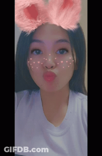 Girl In Pink Bunny Ears And Heart Face GIF