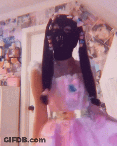 Girl In Pink Dress And Ski Mask GIF