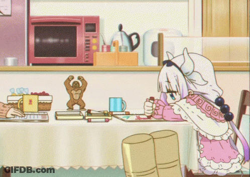 Girl In Pink Dress At Table With Microwave GIF