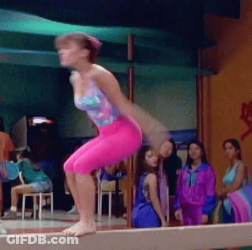 Girl In Pink Jumping On Balance Beam GIF