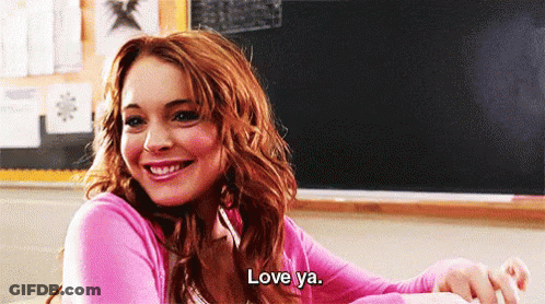 Girl In Pink Sweater Saying Love Ya GIF