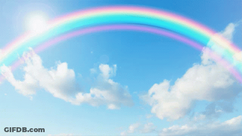 Girl In Pirate Outfit Under Rainbow GIF