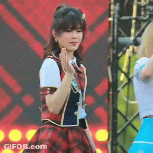 Girl In Plaid Dress Dancing On Stage GIF