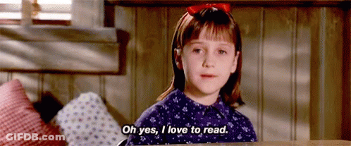 Girl In Purple Dress Reading GIF