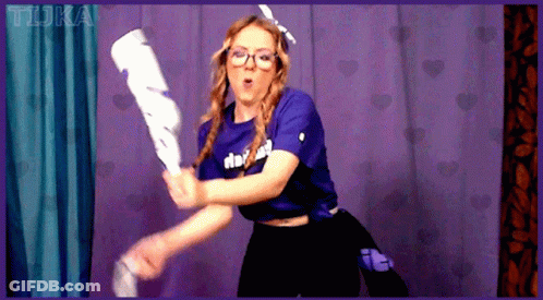 Girl In Purple Shirt With Doki Holding Bat GIF