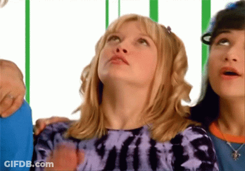Girl In Purple Tie Dye Shirt Looking Up GIF