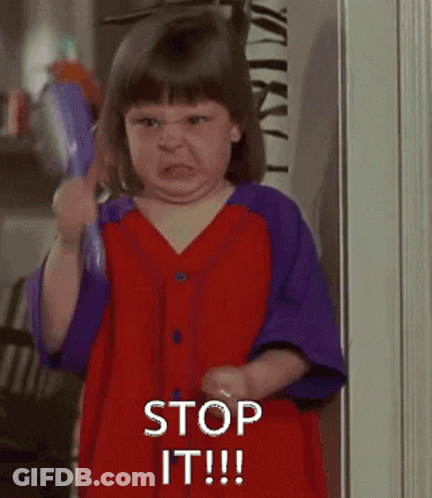 Girl In Red And Purple Dress Saying Stop GIF