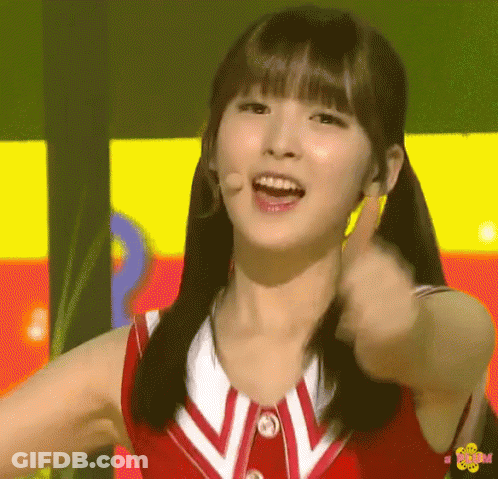 Girl In Red And White Uniform Giving Thumbs Up GIF