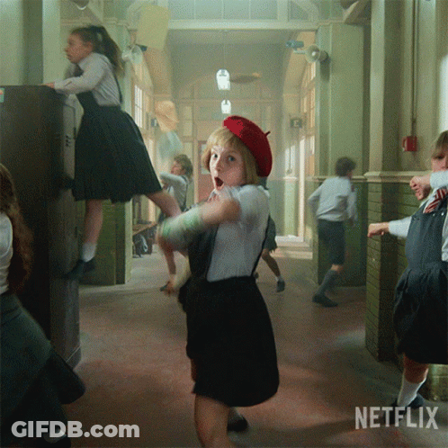 Girl In Red Beret In Hallway GIF