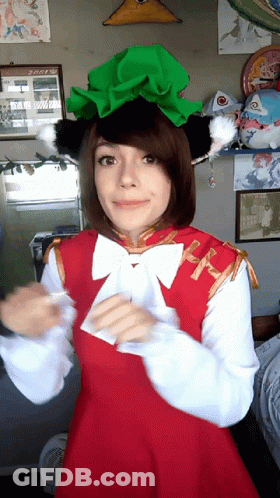 Girl In Red Dress And Green Hat With Letter R GIF