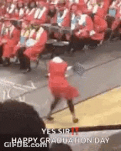 Girl In Red Dress Dancing At Graduation GIF