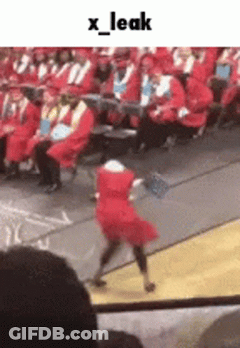 Girl In Red Dress Dancing At Graduation GIF