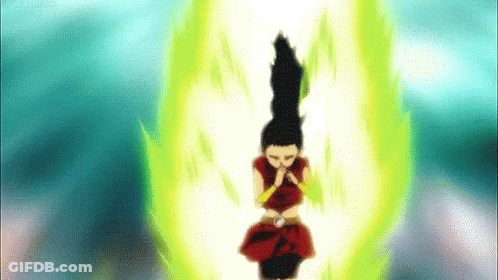 Girl In Red Dress Surrounded By Yellow Light GIF