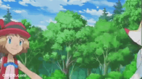 Girl In Red Hat Holding Fox Hand In Forest GIF