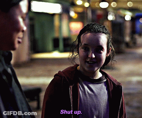 Girl In Red Hoodie Saying Shut Up In Purple Letters GIF