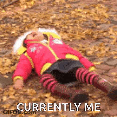 Girl In Red Jacket Lying On Ground GIF