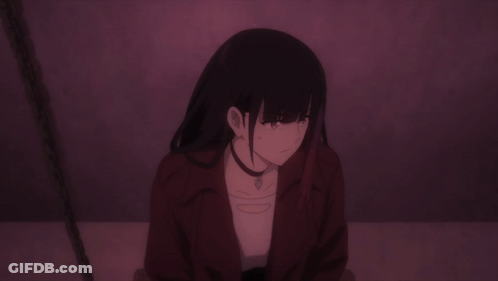 Girl In Red Jacket Sitting In Dark Room GIF
